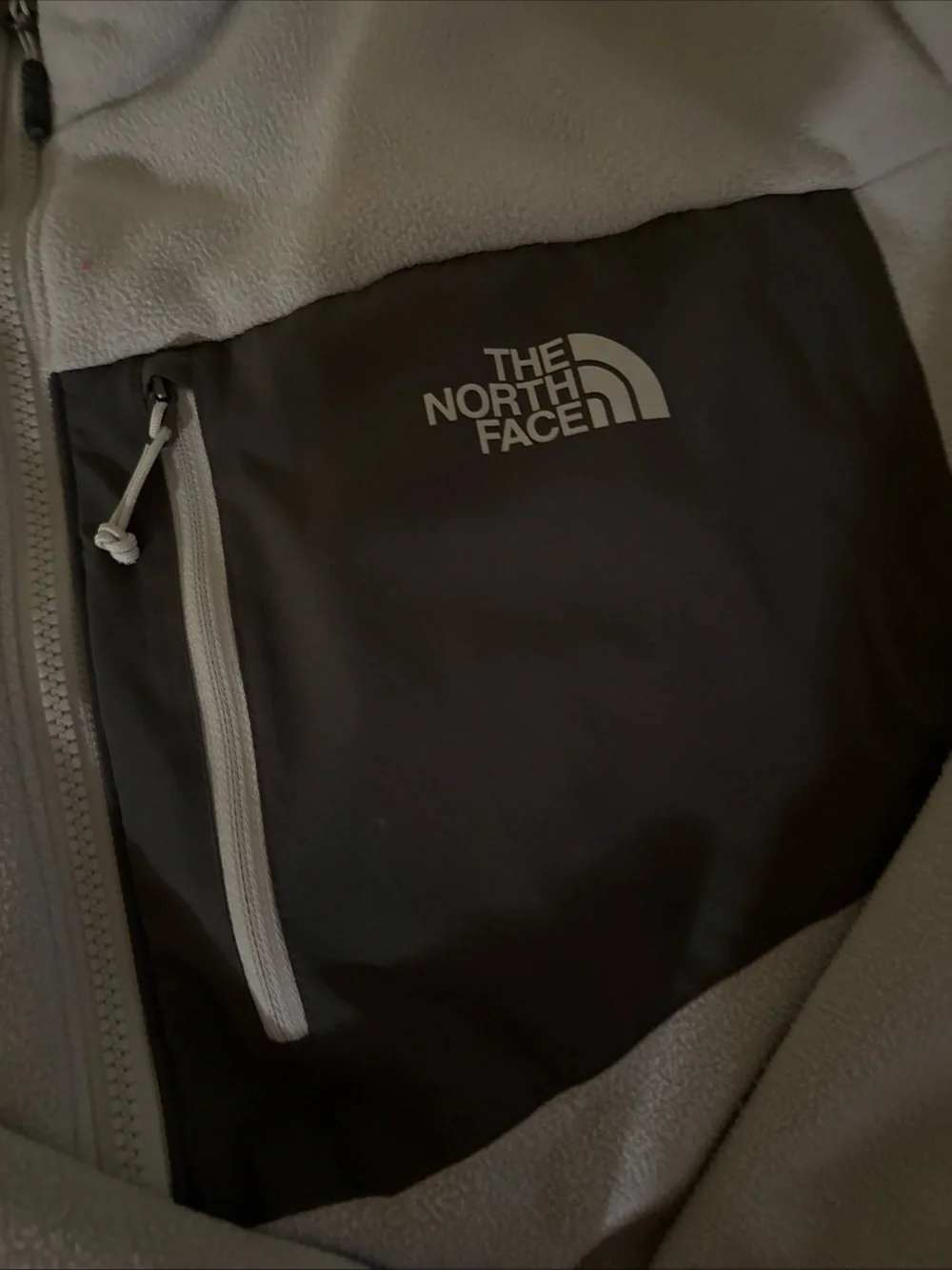 The North Face Men's Light Gray Fleece Jacket with Dark Chest Pocket
